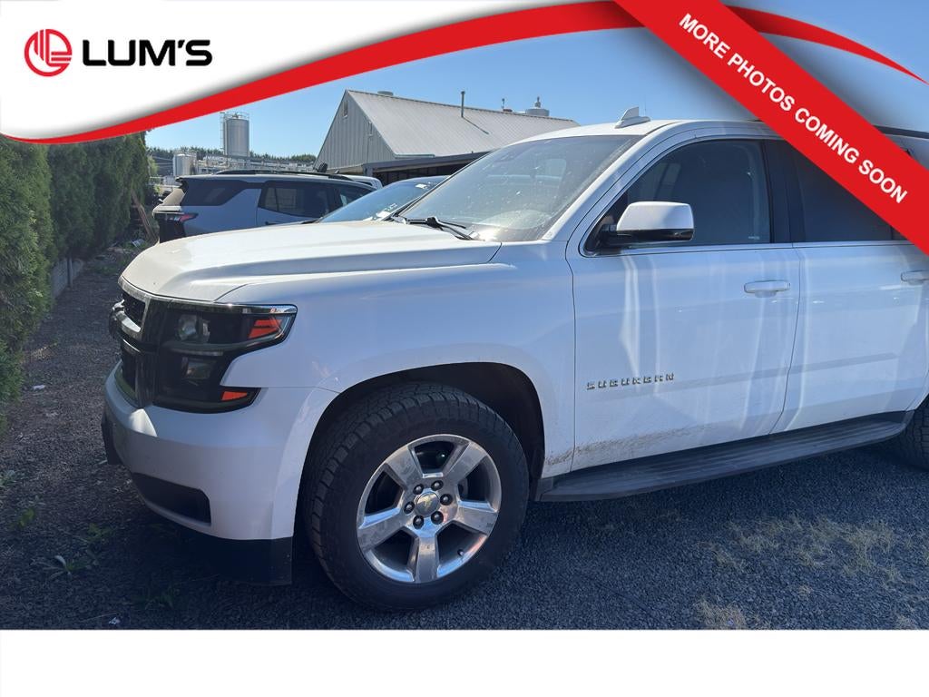 2016 Chevrolet Suburban LT in Summit White — front three-quarter view