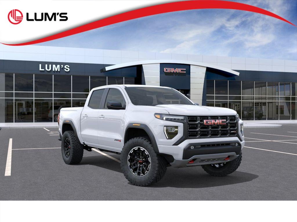 2026 GMC Canyon AT4 in Summit White — front three-quarter view