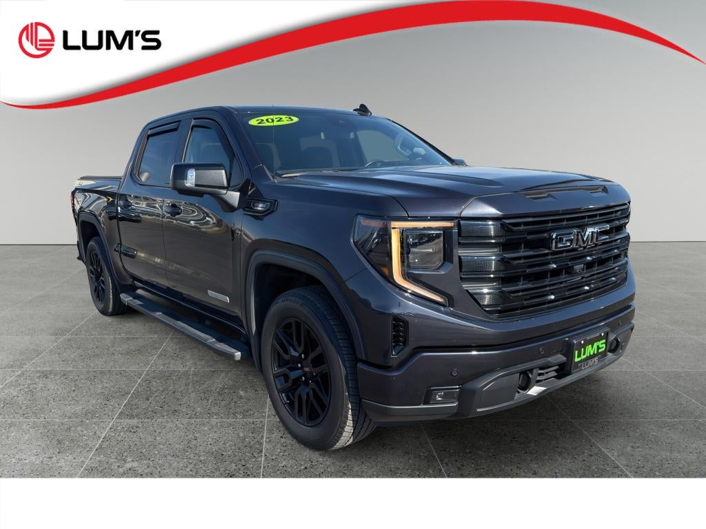 2023 GMC Sierra 1500 Denali in Titanium Rush Metallic — front three-quarter view