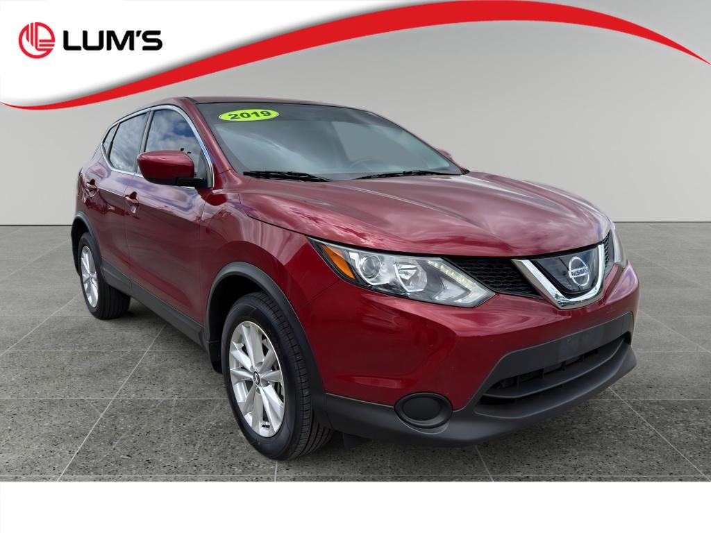 2019 Nissan Rogue Sport S in Red — front three-quarter view